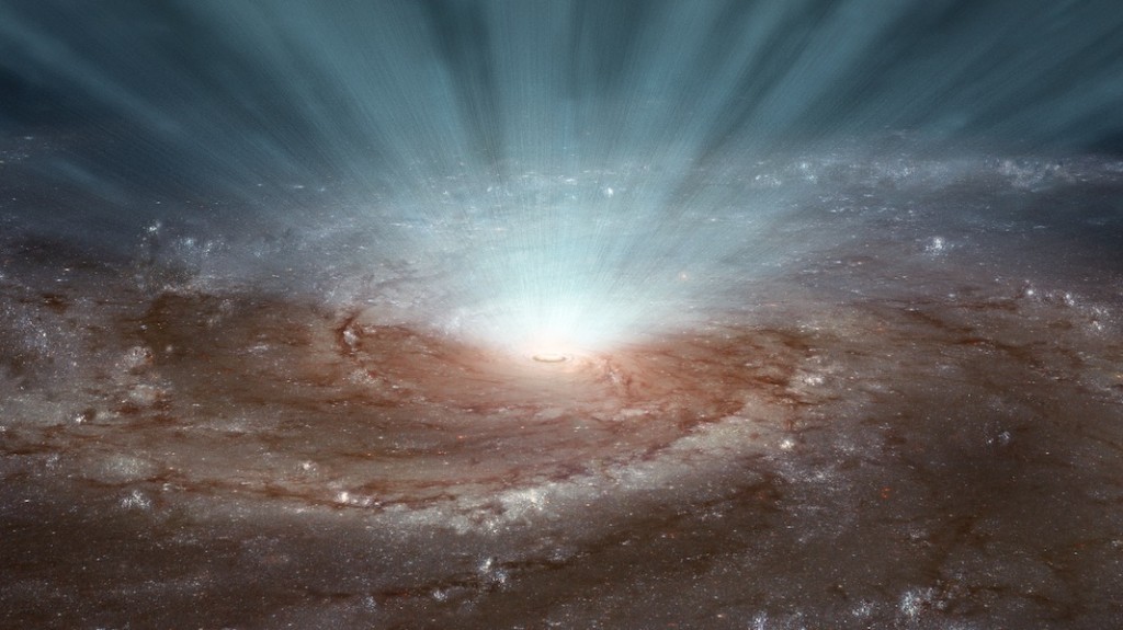  Os buracos negros supermassivos nos núcleo de galáxias libertam radiação e ventos ultra-rápidos, como ilustrado nesta impressão de artista. Os telescópios NuSTAR da NASA e XMM-Newton da ESA mostraram que estes ventos, contendo átomos altamente ionizados, sopram de uma forma quase esférica.