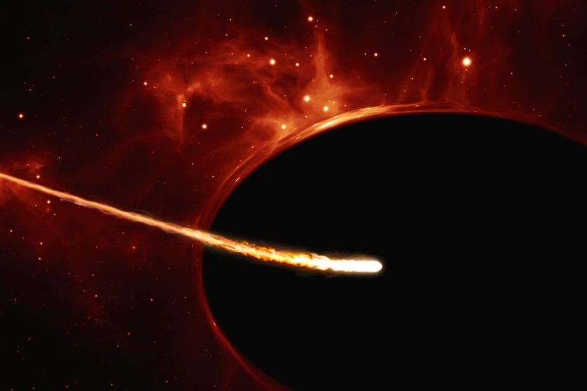 Ilustração que mostra uma estrela de baixa-massa a ser engolida por um buraco negro super-massivo.