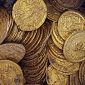 Centenas de moedas romanas de ouro são encontradas no porão de teatro abandonado