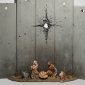 Presépio de Banksy tem muro com perfuração de bala